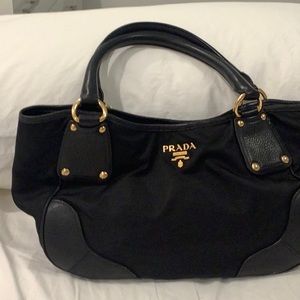 Prada bag. Worn. Minor flaws see photos.